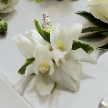 White Mini Cymbidium Boutonniere –  Elite Flowers Of Hemet, Hemet CA